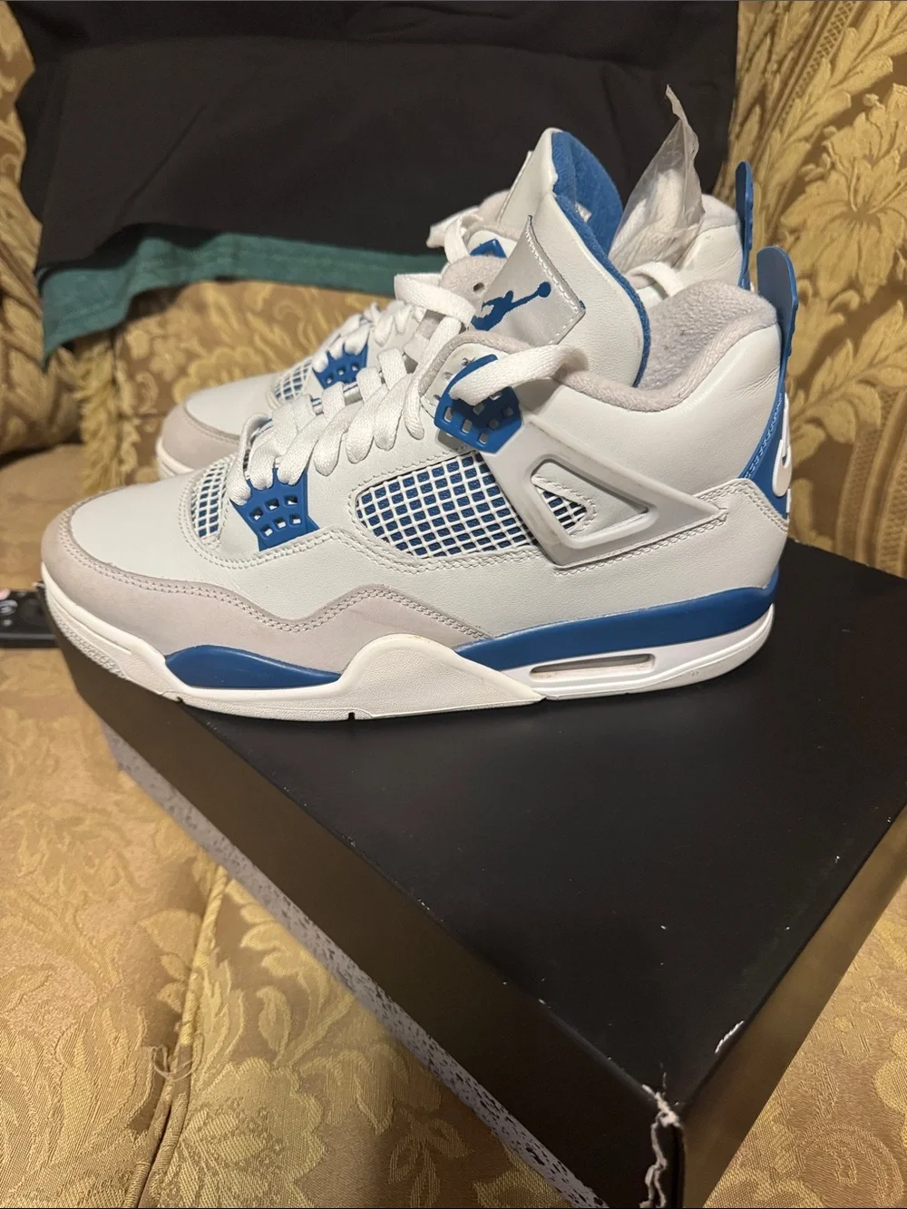 Jordan Men’s Retro 4 White and Blue Sneakers